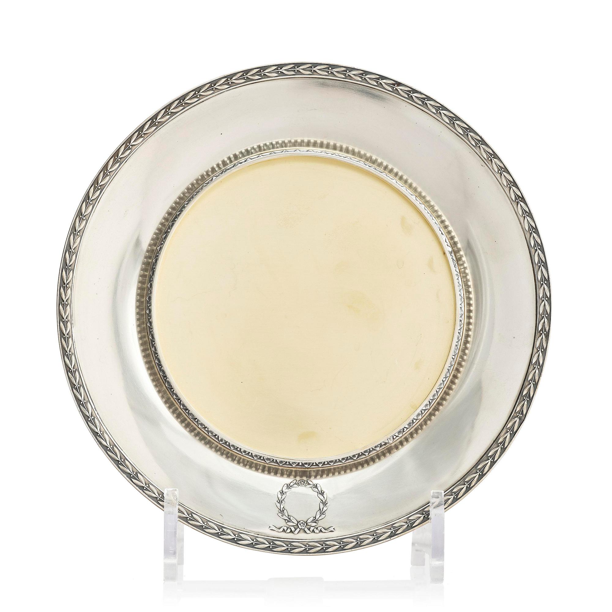 A Swedish parcel-gilt silver coaster, mark of W.A. Bolin, Stockholm 1920.