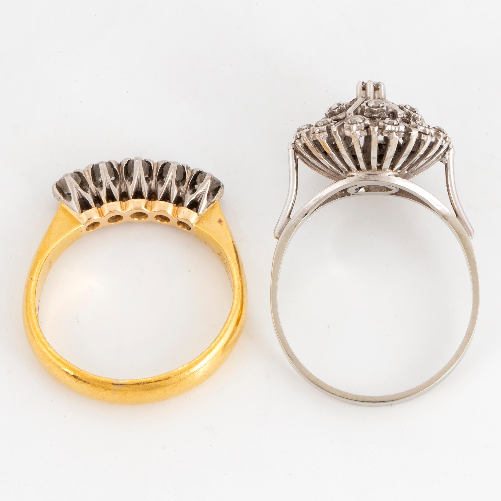 Two rings 23K gold and 18K vitguld.