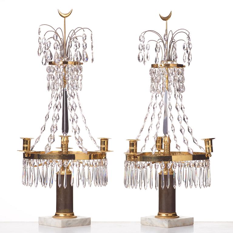 A pair of Gustavian three-light girandoles, late 18th century.