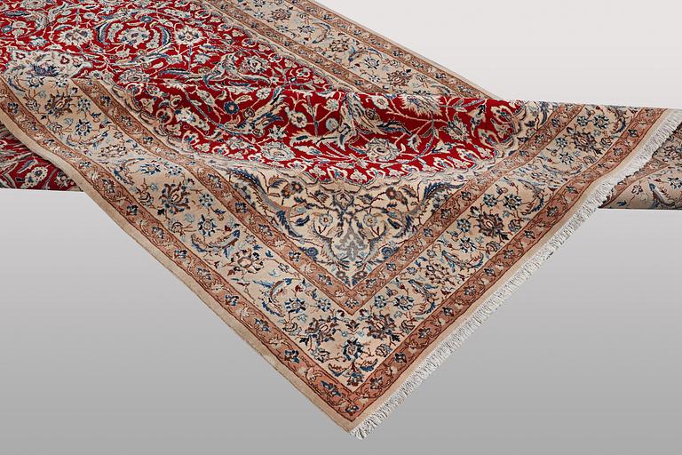 A carpet, Nain, part silk, 9 Laa, ca 295 x 178 cm.