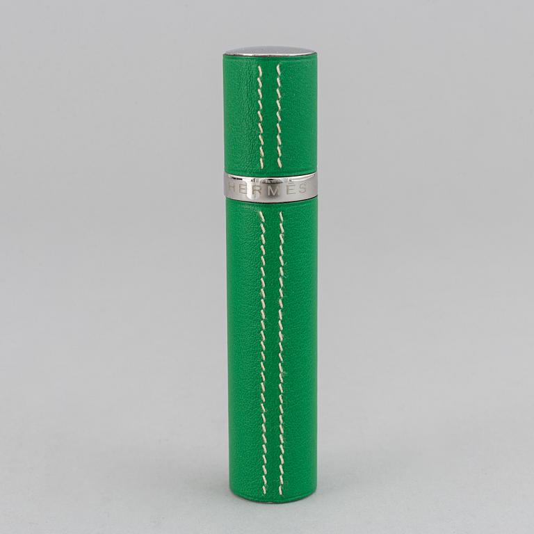 Hermès, refillable perfume bottle in leather.