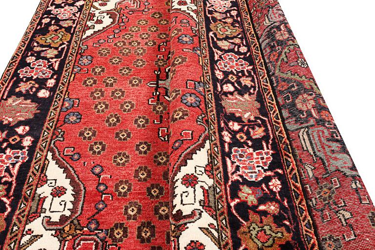 An Azerbaijan carpet, c. 306 x 208 cm.