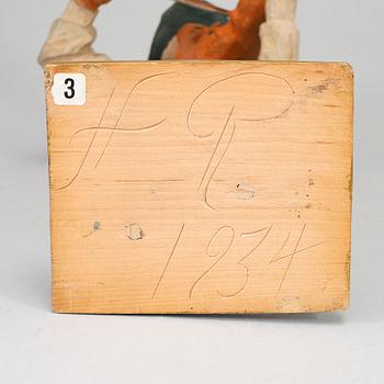 HERMAN ROSELL, a painted wood sculpture signed and dated 1934.