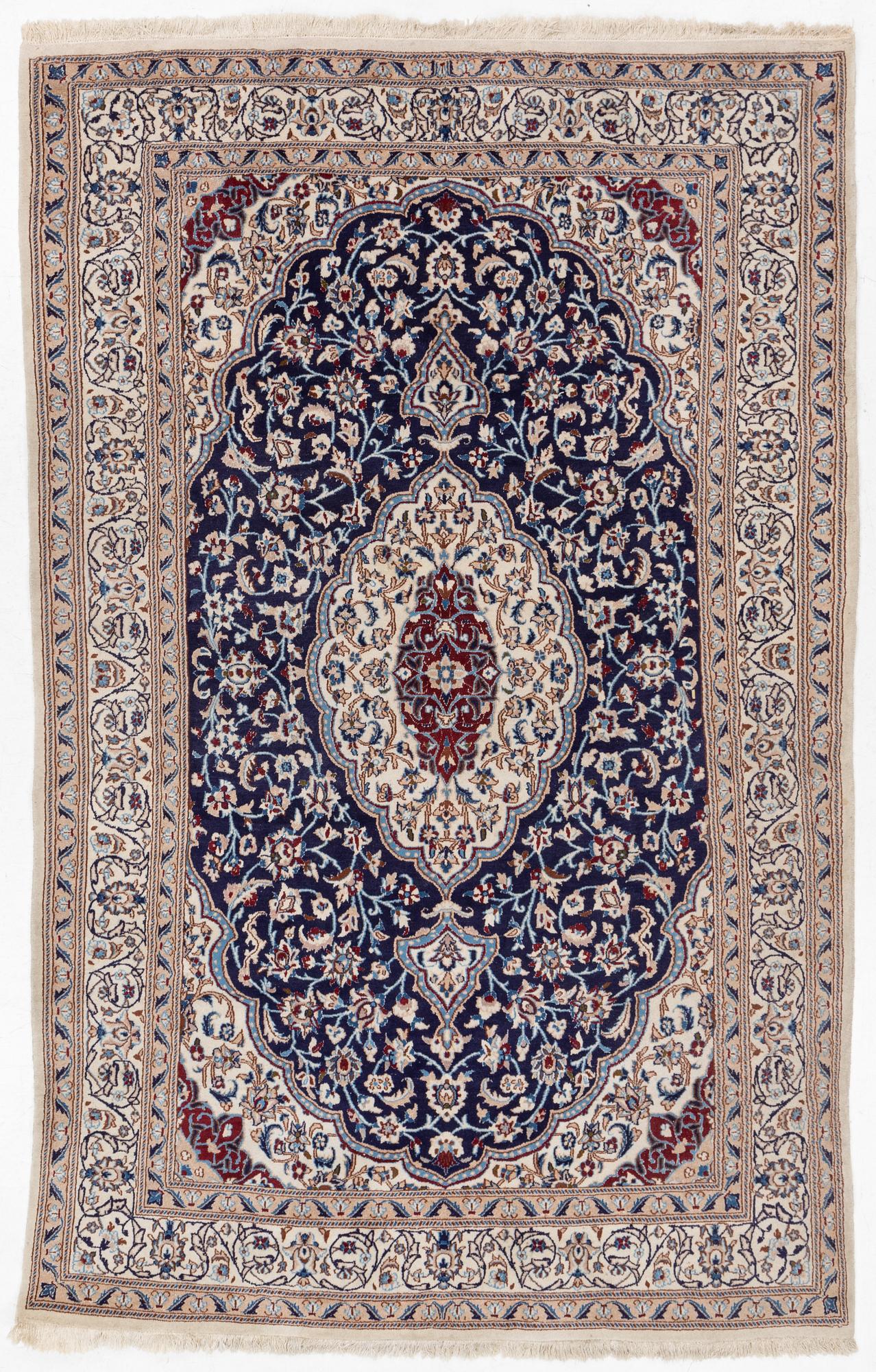A Nain carpet, c. 295 x 190 cm.