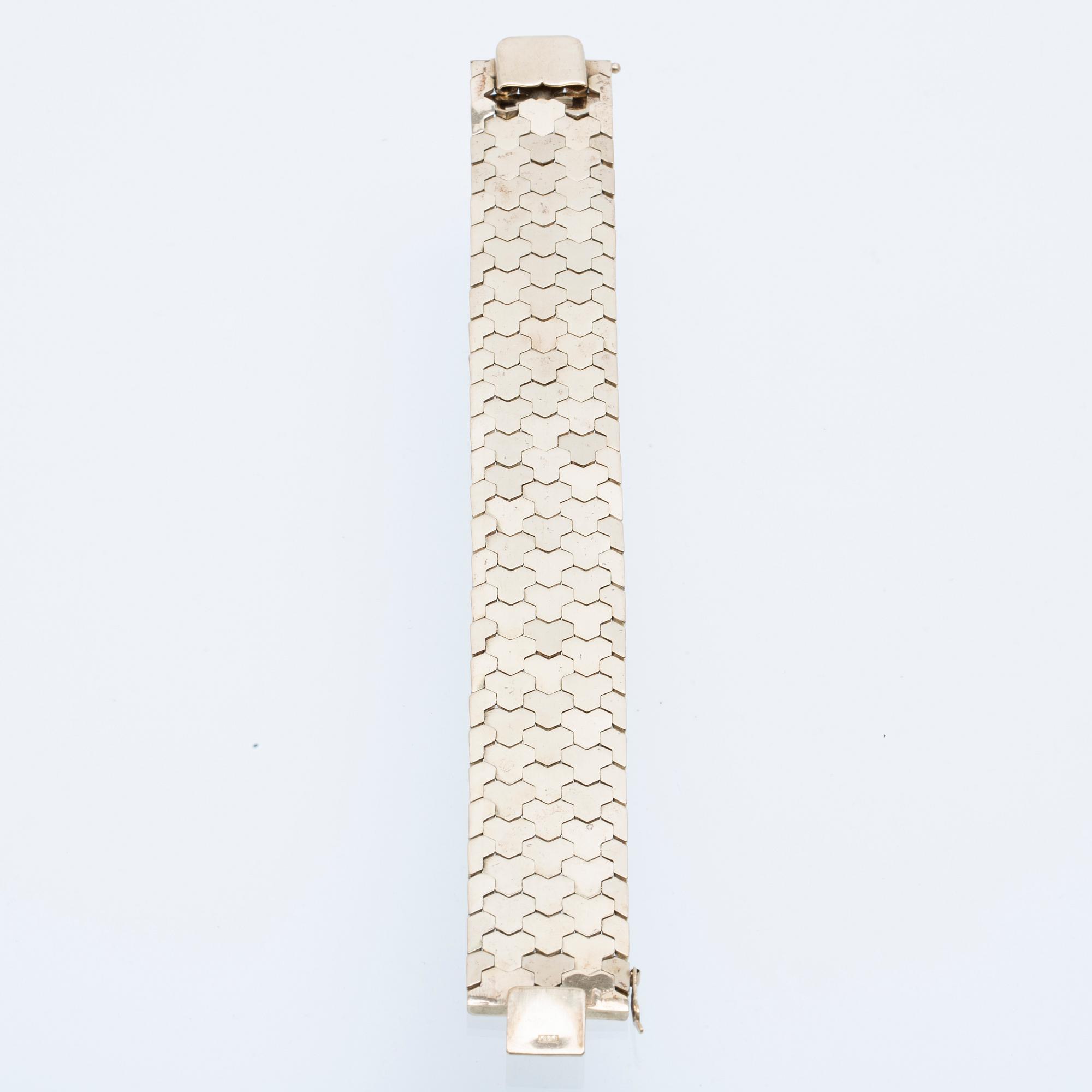 A 14K gold bracelet.