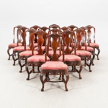 A mahogany 17 pcs Chippendale dining set first half of the 20th century.