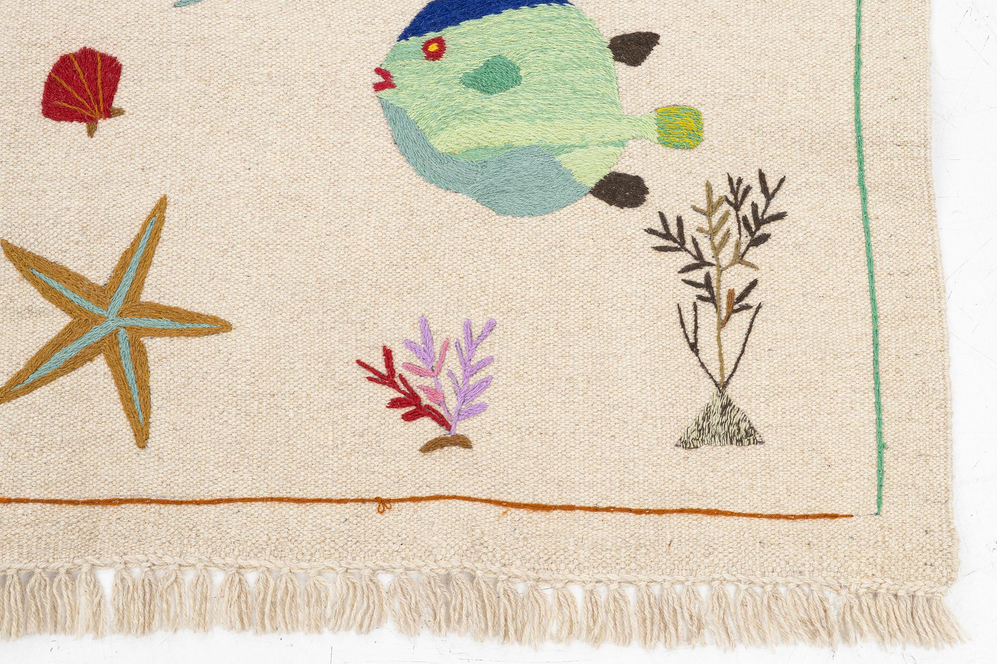 A hand-embroidered Kelim rug, c. 195 x 143 cm.