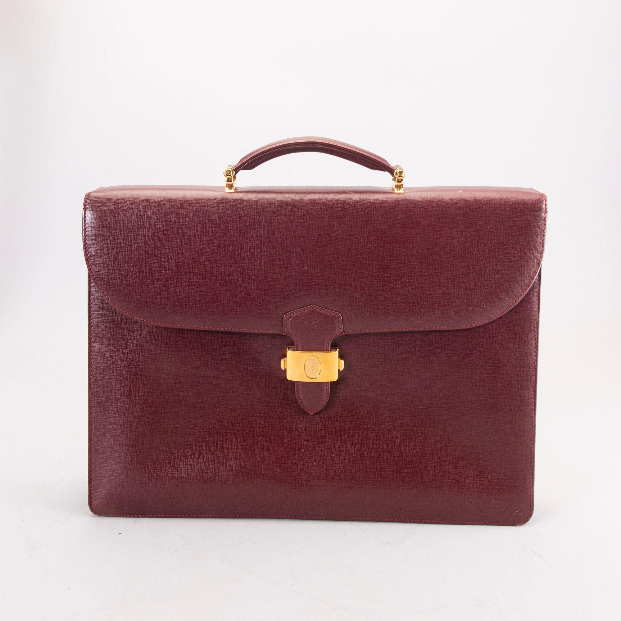 A Cartier leather briefcase.