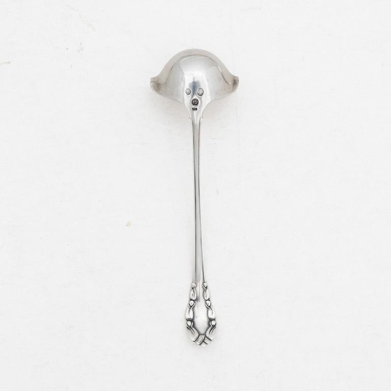 Georg Jensen, a small sterling silver gravy ladle, model "Liljekonvalj"(Lily of the Valley), Copenhagen, Denmark, 1929.