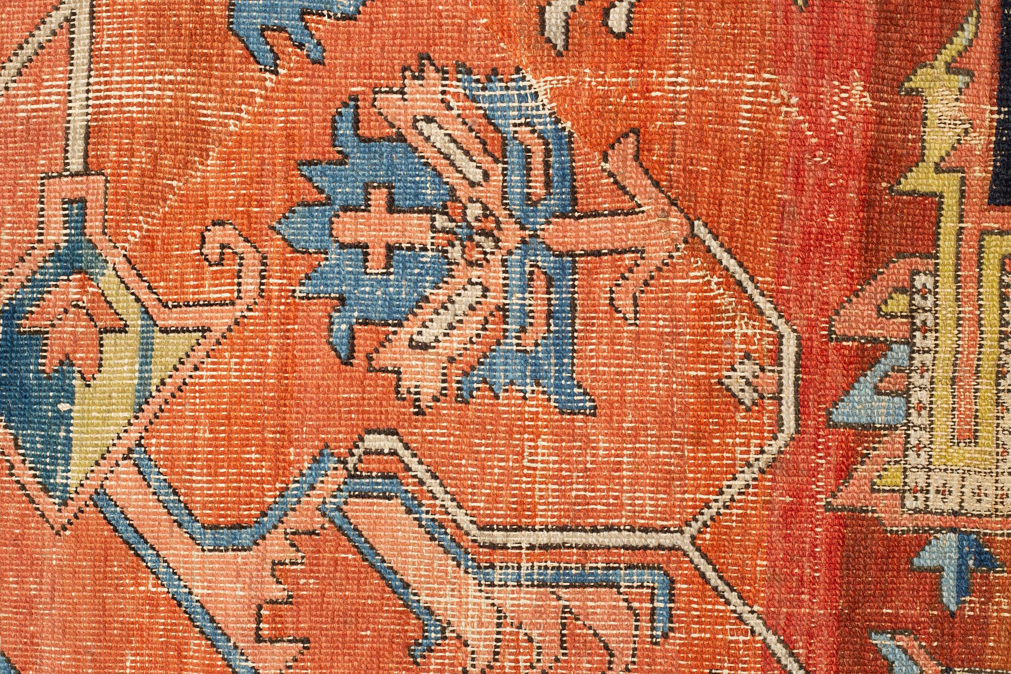 A carpet, an antique Heriz, ca 469,5-471 x 300-309,5 cm.