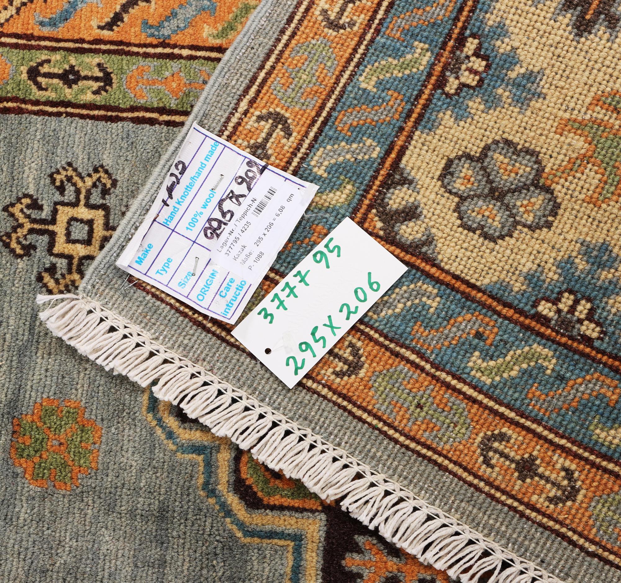 A Kazak carpet, c. 295 x 206 cm.