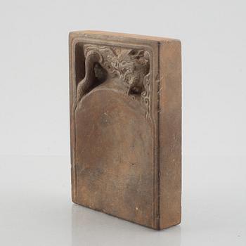 A Chinese ink stone with an inscription, Qing dynasty or older.
