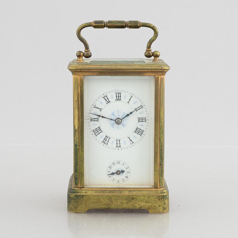A carriage alarm clock, around 1900.