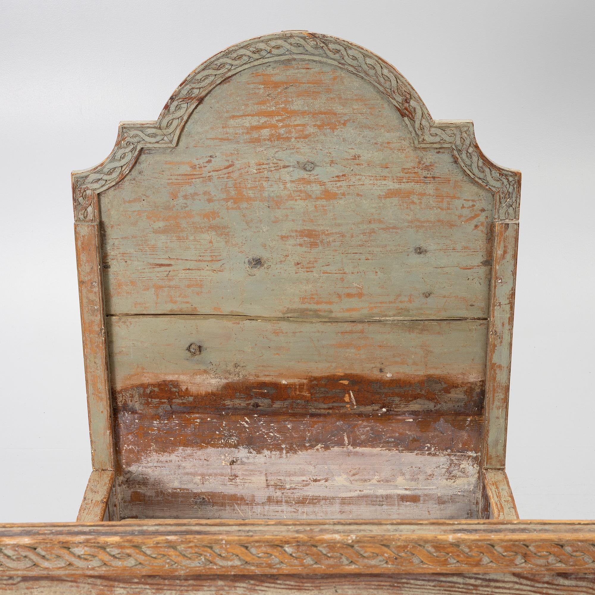 A Gustavian carved bedframe, late 18th century.