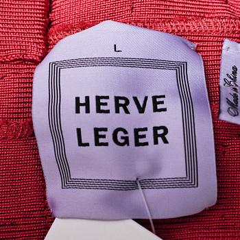 A pink and purple tight, strech dress by Herve Leger.