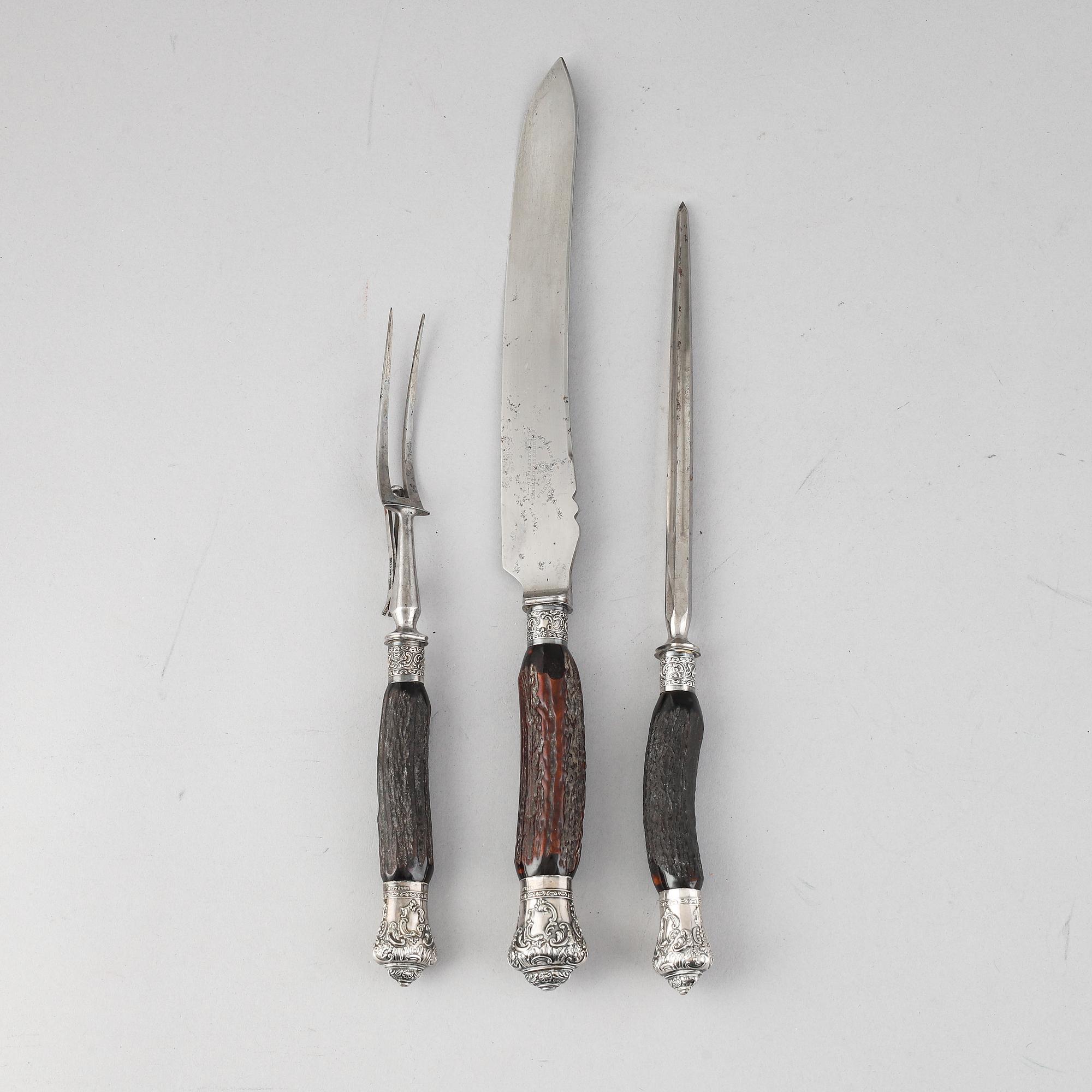 An English 19th century three piece set of serving cutlery.