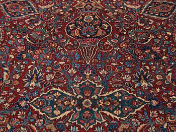 A CARPET,  a semi-antique Mashad, ca 544,5 x 356 cm, signed "Work by Makhmalbaf".