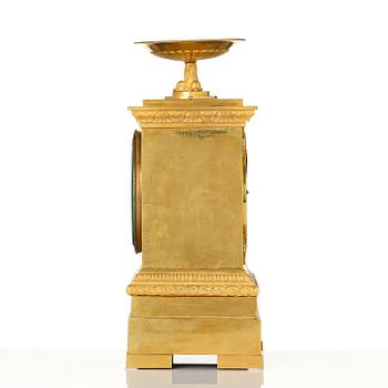 A French Empire ormolu mantel clock by Louis-Isidore Choiselat (master in Paris 1813-47).
