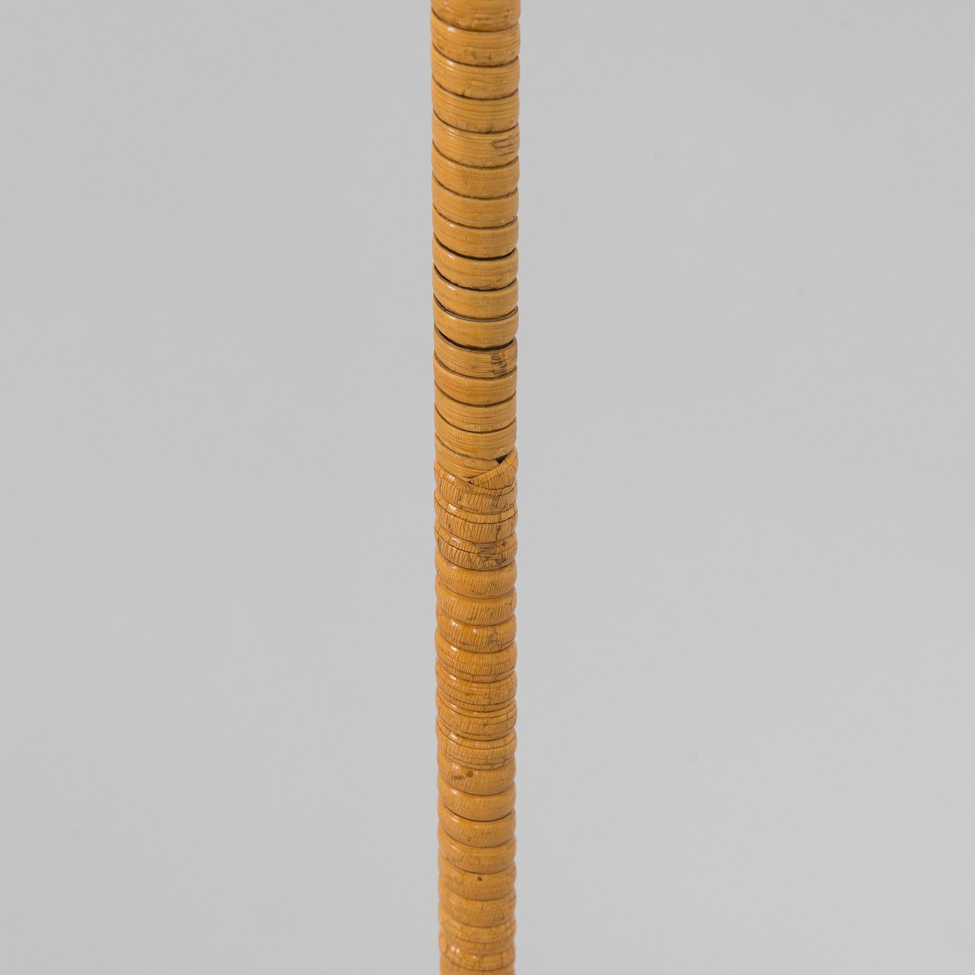 Paavo Tynell, a mid-20th century K10-10 floor lamp for Idman.