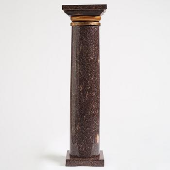 A Swedish porphyry column, 19th century.