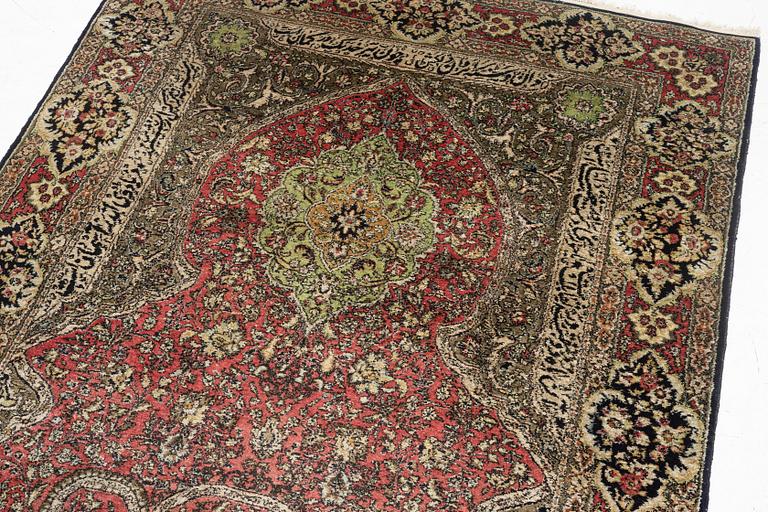 A semi-antique silk Quum, c. 216 x 141 cm.