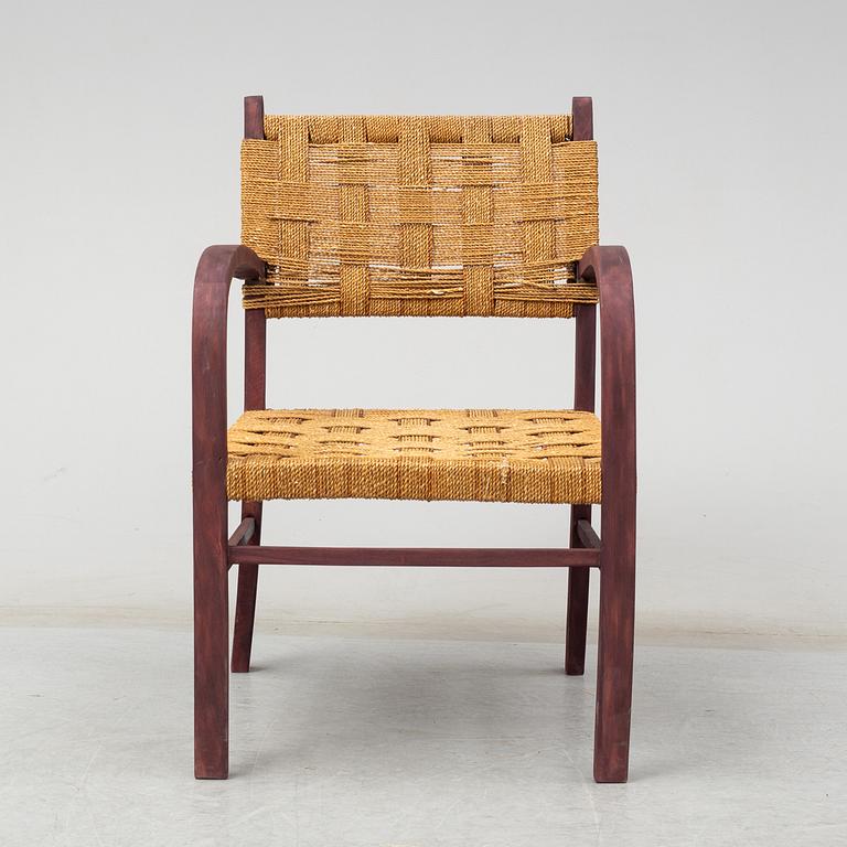 AXEL LARSSON, a stained beech armchair from Bodafors, 1930's.