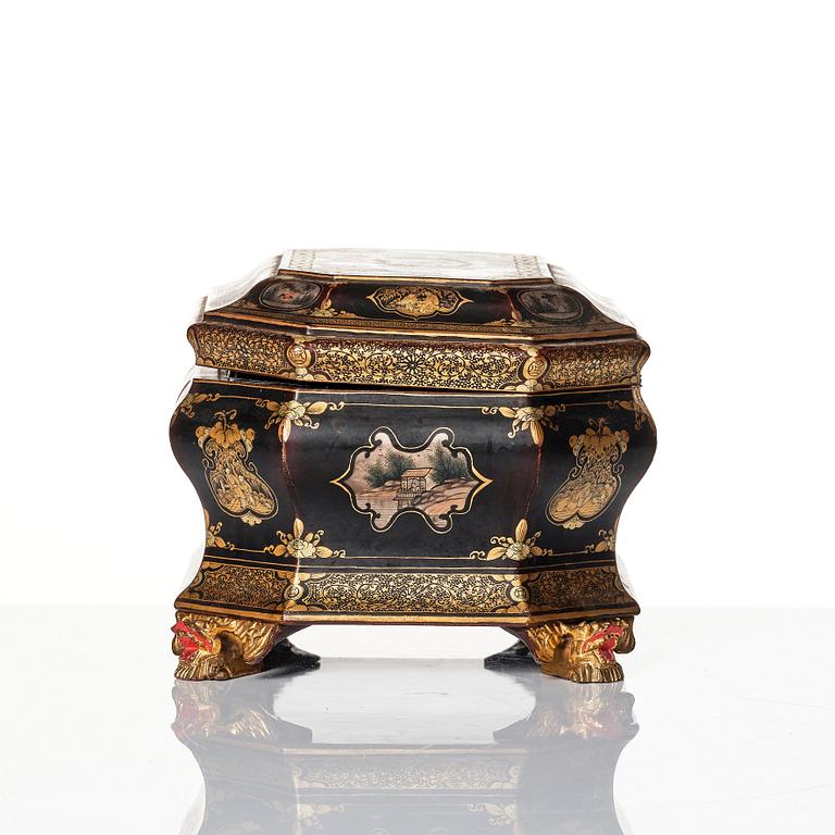 A Chinese lacquered tea caddy with pewter boxes, Qing dynasty, 19th Century.