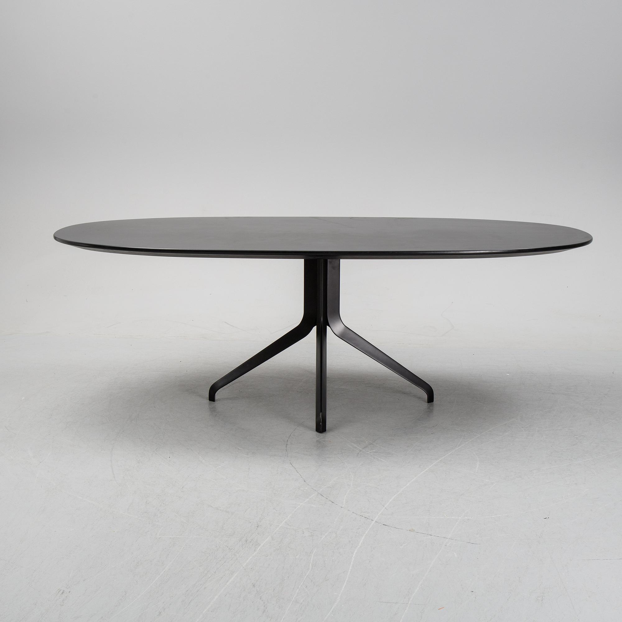 Rodolfo Dordoni, a 'Claydon' dining table, Minotti, Italy.