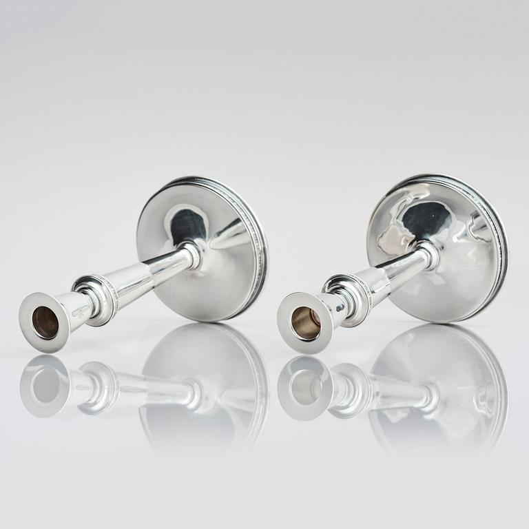 Eric Råström, a pair of silver candlesticks, company CG Råström, Stockholm 1974.