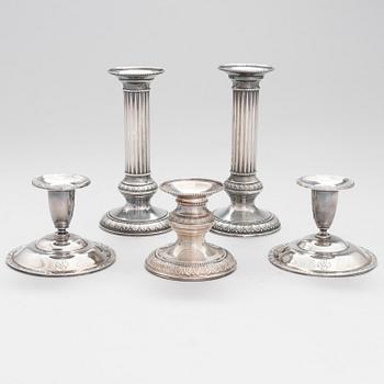 Five silver candlesticks, Finnish marks,1967-2006.