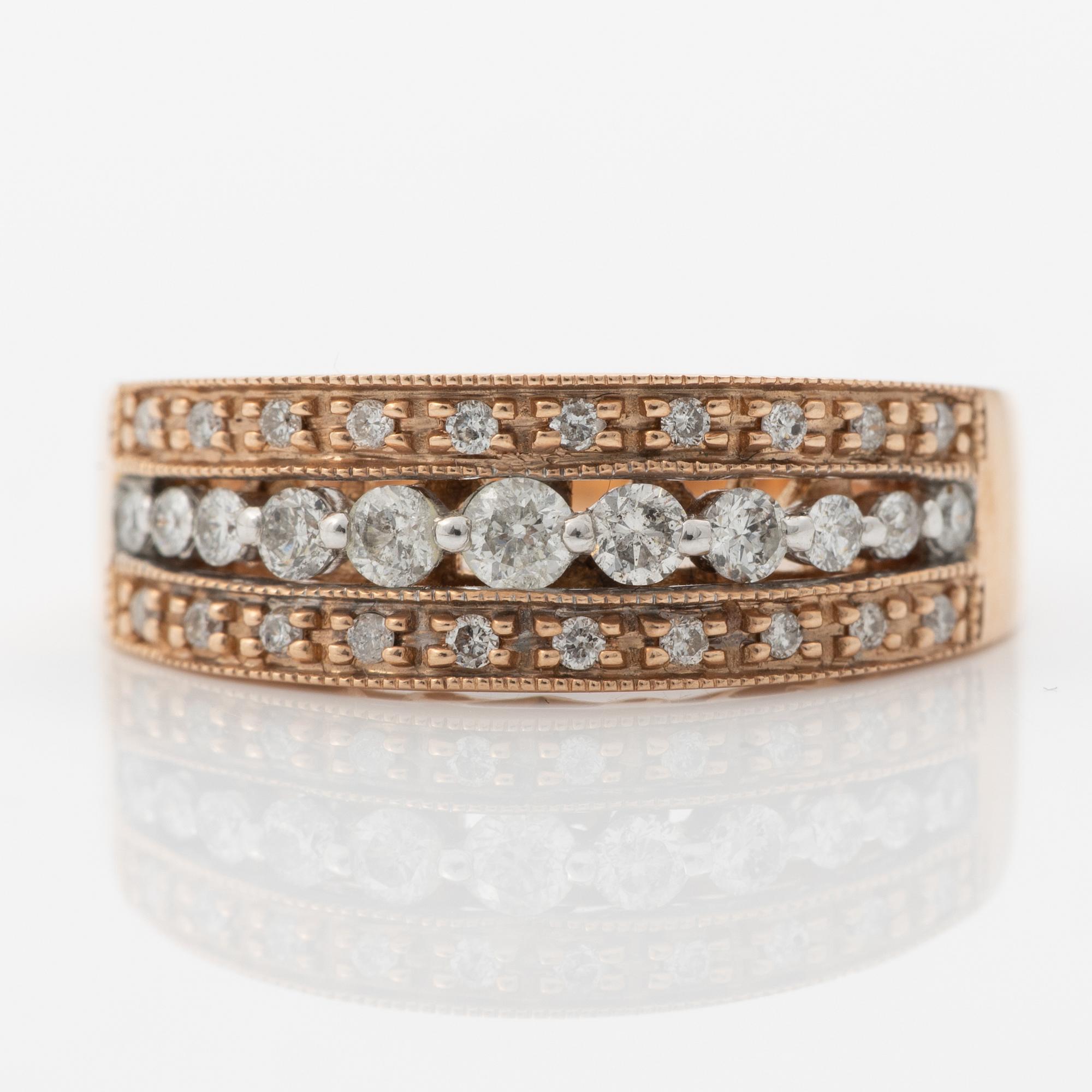 14K rose gold ring with round brilliant-cut diamonds.