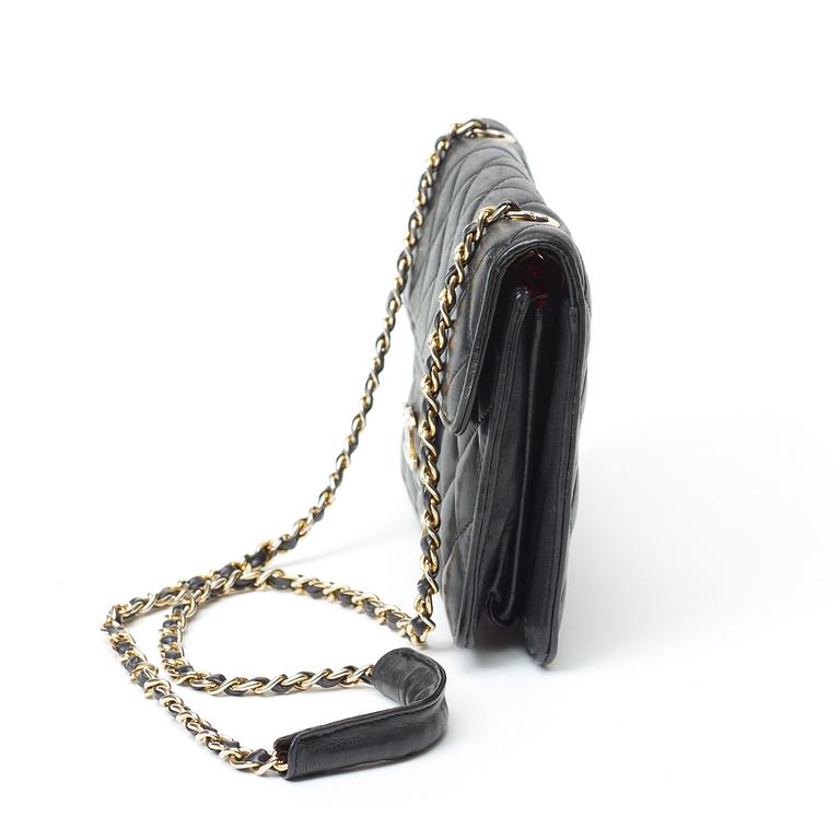 A 1970s black quilt leather shoulder bag by Chanel.