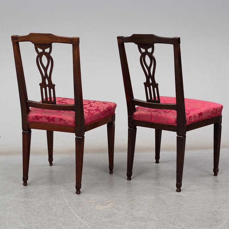 A pair of early 19th century mahogany chairs.