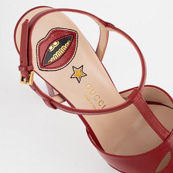 Gucci, a pair of red leather high heel shoes, 2016, size 37.