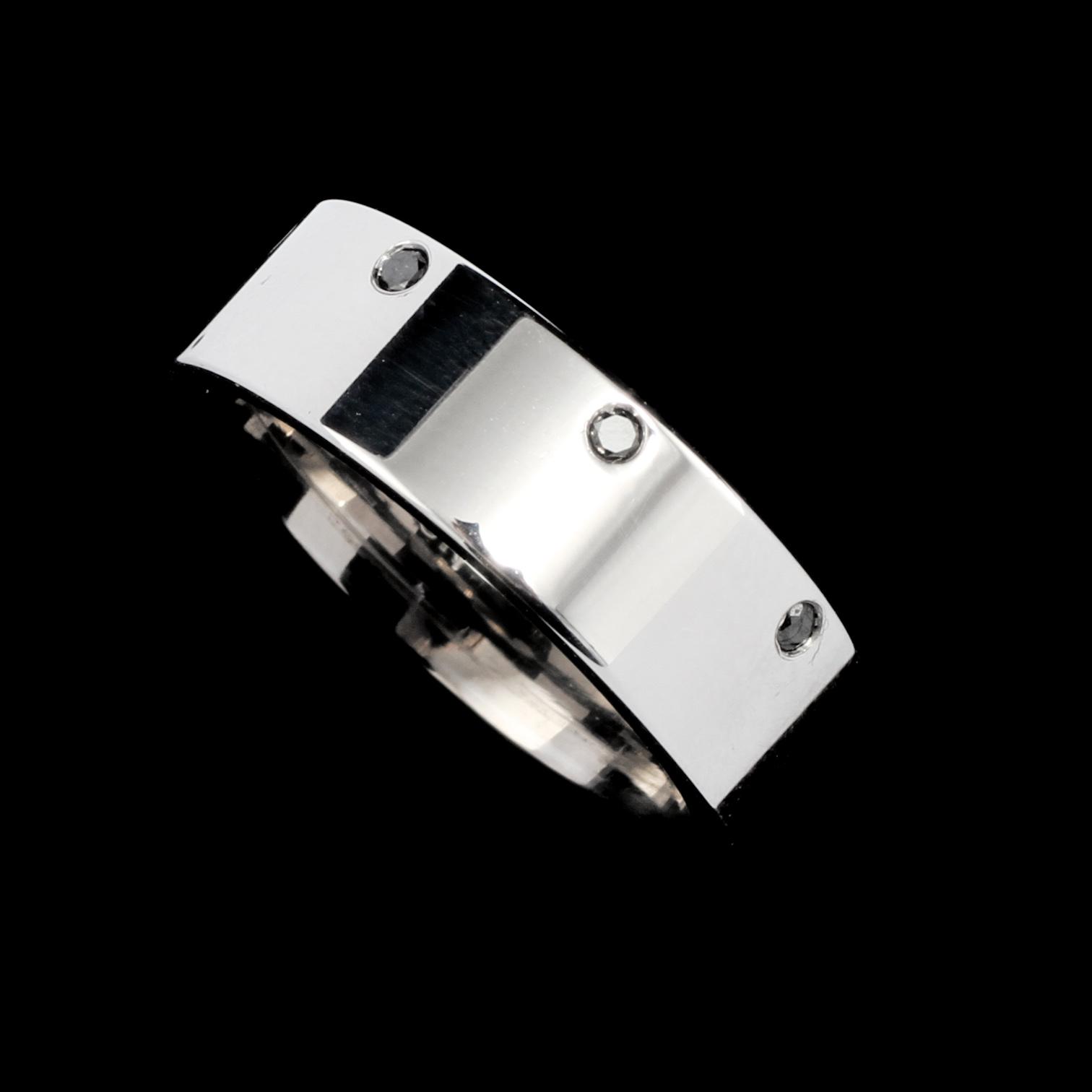 RING, 18k vitguld med 8 svarta briljantslipade diamanter, totalt 0.16 ct, Scahlins No1, Scahlins, Stockholm. Vikt 12 g.