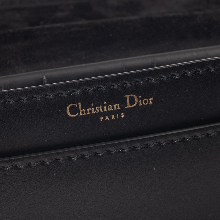 Christian Dior, A black leather "Dio(r)evolution" bag.