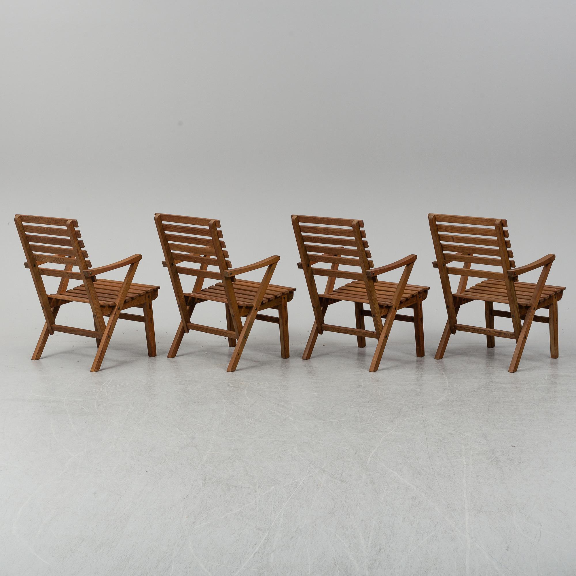 A Carl Malmsten "Bergshamra" garden table and four chairs, first half of the 20th century.