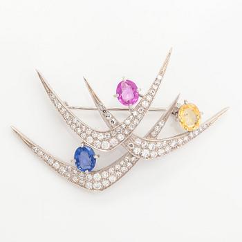 An 18K white gold brooch, with diamonds and sapphires. C F Carlman, Stockholm 1971.