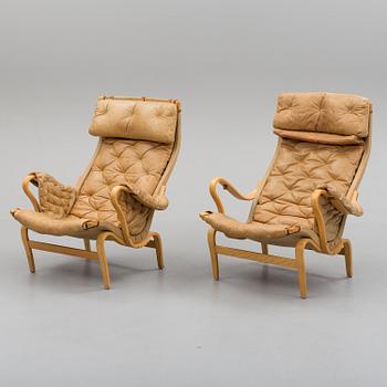 a pair of 'Pernilla' easy chairs by Bruno Mathsson, second half of the 20th century.