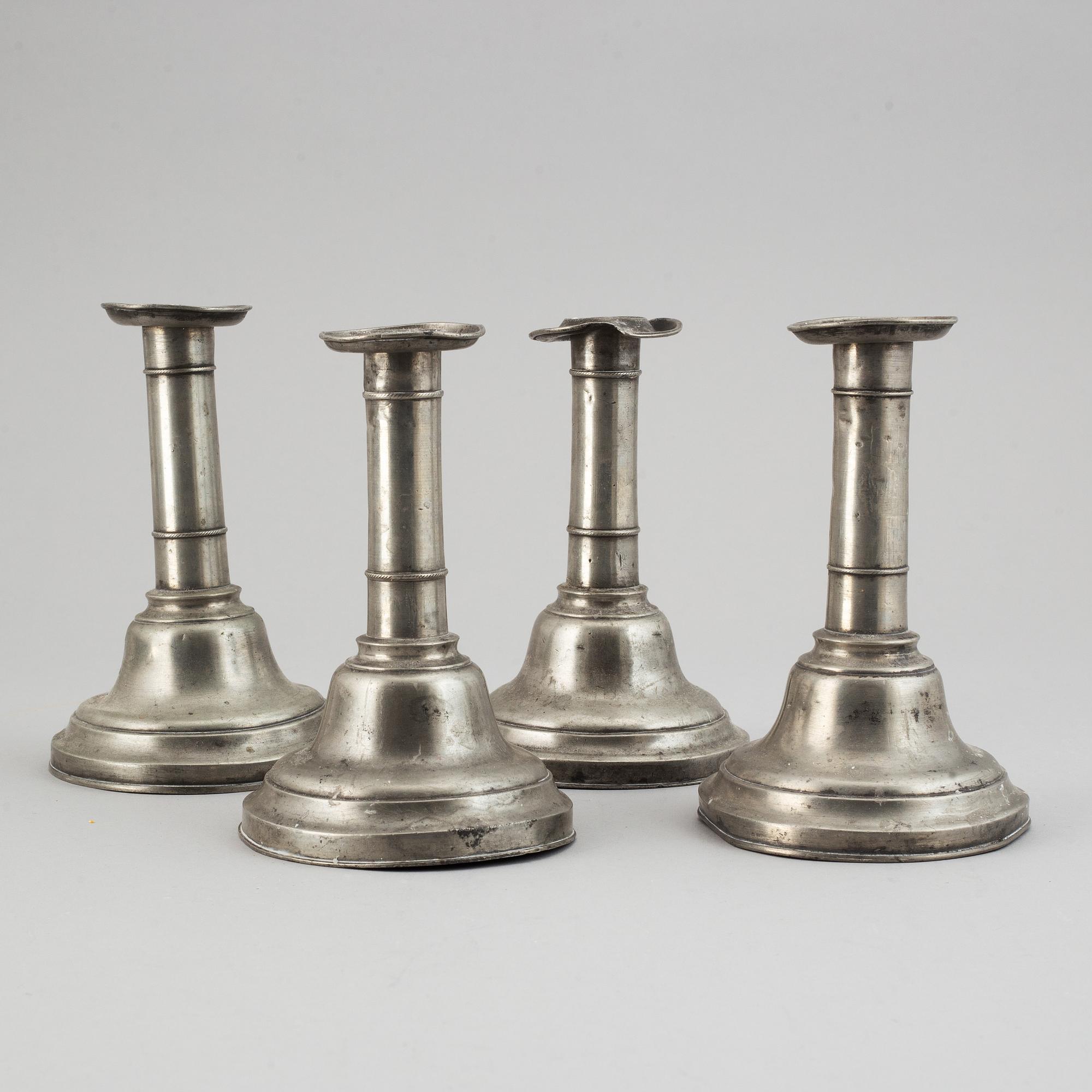 A set of 4 pewter candle sticks, Lund, 19th Century.