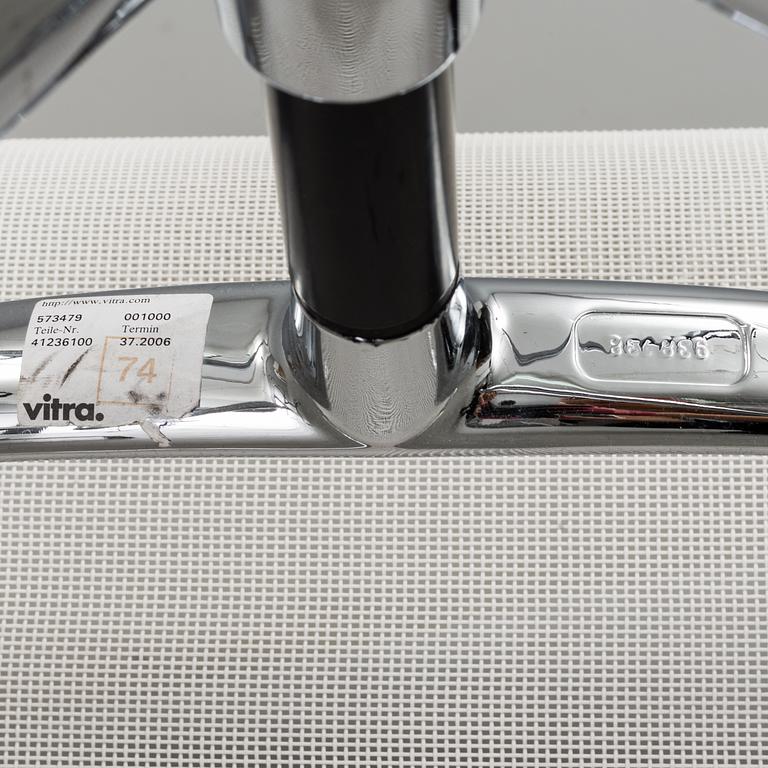 A pair of 'EA 108' desk chairs by Charles & Ray Eames for Vitra.