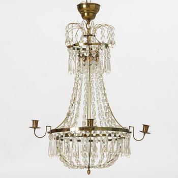 A four-branch Gustavian style chandelier, mid 20th century.