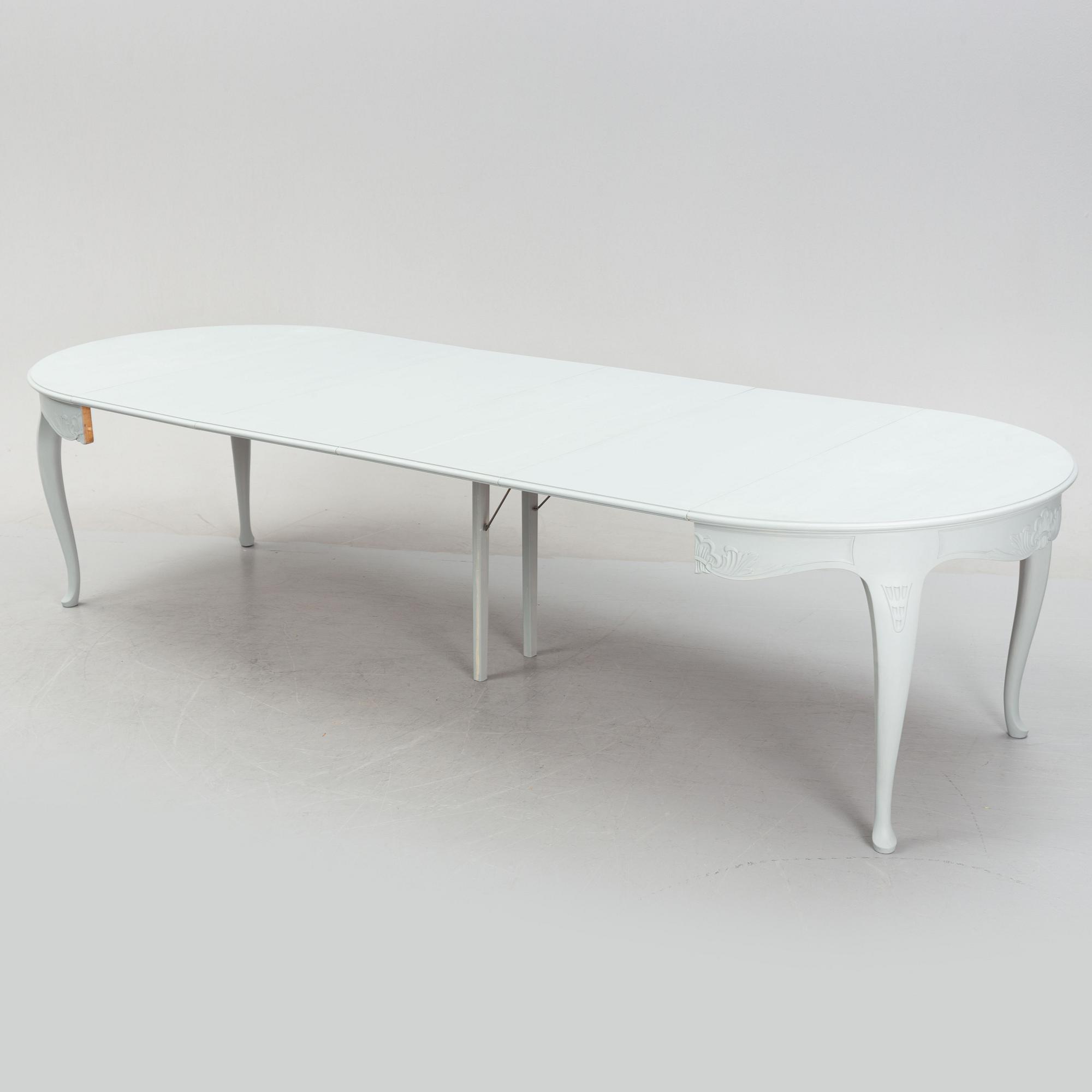 A Rococo style dining table, second half of the 20th Century.
