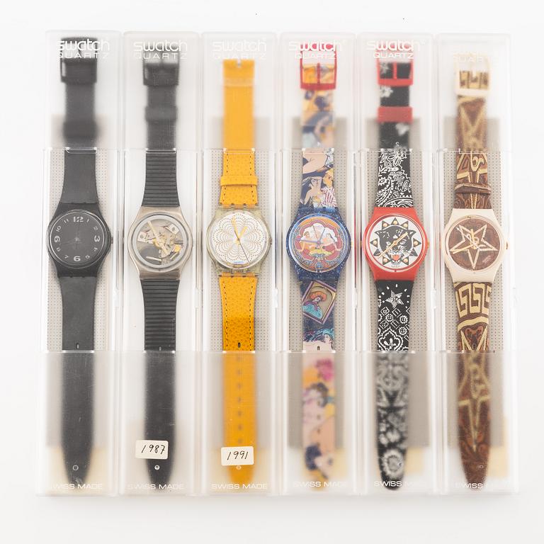 Parti med 21 Swatch-klockor, gummiband och klocklitteratur, "No Reserve".