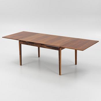 A Danish Dining Table and Six Chairs, 1960s.