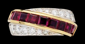 417. A gold, ruby and diamond ring.