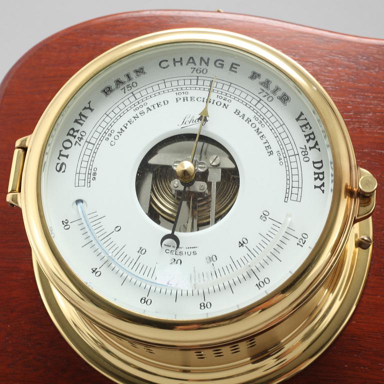A wall clock and a barometer from Schatz.