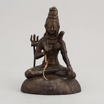 A seated bronze sculpture of the Hindu god Shiva, preusmably ca 1900.