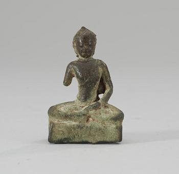 174. A Javanese bronze Buddha, circa AD 900-1100.