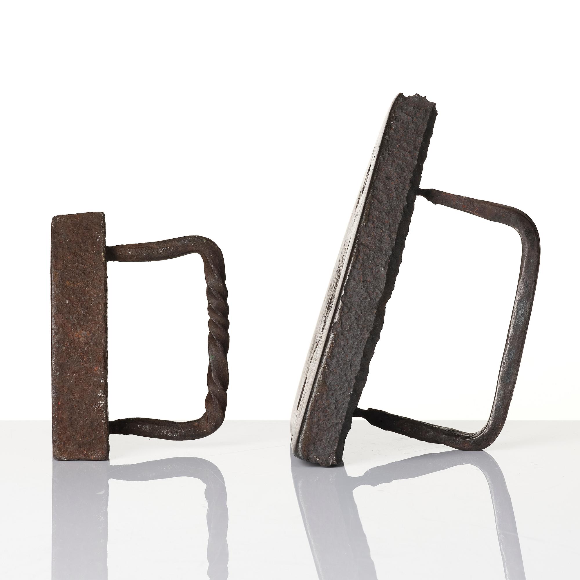 Two cast iron clothes irons, 18th / early 19th century.